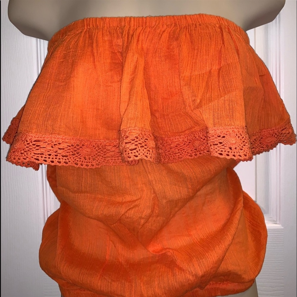 Orange sleeveless top
